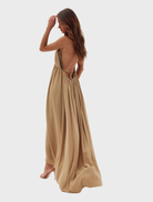 Khaki Fendi Dessire Dress draped elegantly, emphasizing its chic design and soft fabric texture.