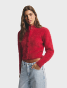 Flame-colored Bella Cashmere Cardigan, featuring a luxurious feel and a classic silhouette for versatile wear.