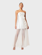 White floral strapless maxi dress with oleander motifs, designed for a stylish and comfortable summer look.