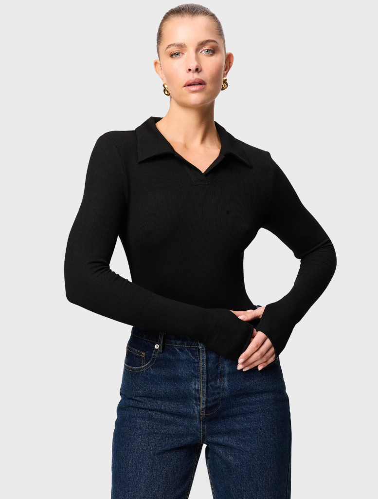 Black Florence polo top featuring a classic design and a comfortable fit, suitable for casual or semi-formal occasions.