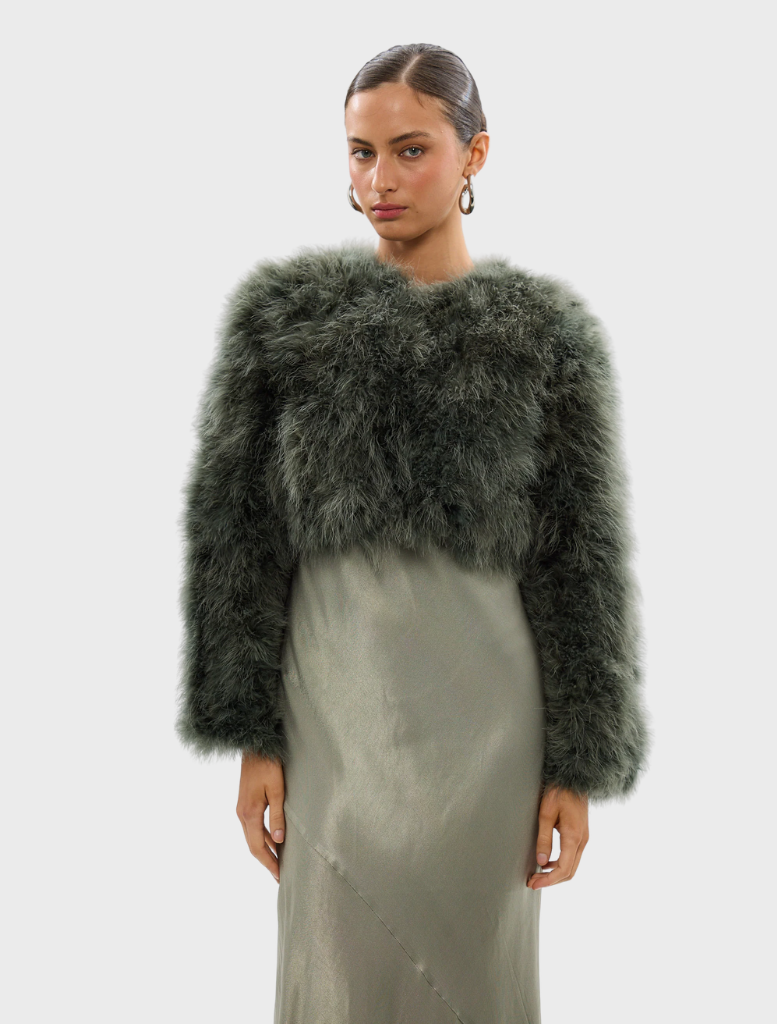 Stylish forest green crop jacket from Manhattan, ideal for adding a trendy touch to any outfit.