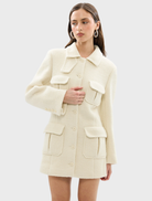 Elegant ivory Franca Wool Blazer Dress with a fitted design, ideal for professional and formal settings.