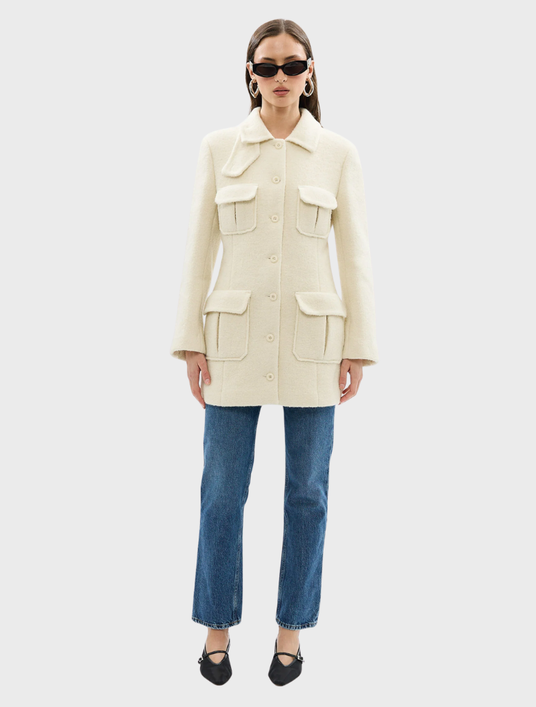 Chic ivory Franca Wool Blazer Dress showcasing a structured fit, suitable for business and upscale events.