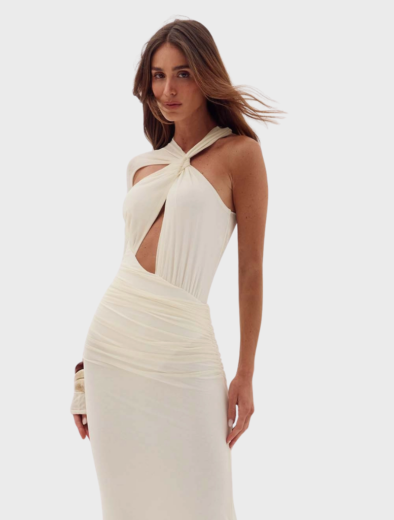 Off-shell Frigga Tule Dress, characterized by its airy fabric and elegant style, perfect for summer celebrations.