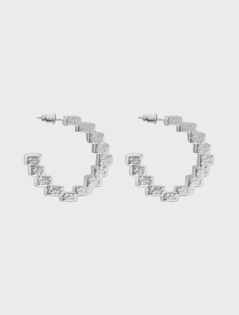 Silver Gabrielle earrings featuring an elegant design suitable for formal and casual occasions.