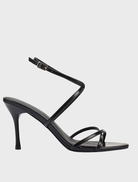 Black Garcelle heel featuring a sleek design and elegant silhouette, perfect for formal or evening wear.
