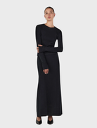 Gerard's black wool skirt, showcasing a timeless silhouette ideal for various outfits.