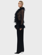 Elegant black Gigi Feather Blouse with soft feather accents, ideal for adding sophistication to any outfit.