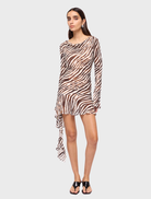 Gigi long sleeve mini dress featuring a bold zebra animal print design, perfect for stylish casual wear.
