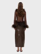 Elegant chocolate sheer blouse adorned with feather accents, perfect for adding a touch of sophistication to any outfit.
