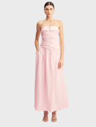 Gigi Strapless Maxi Dress in Sakura print, featuring a flowing silhouette and vibrant floral design for a stylish summer look.