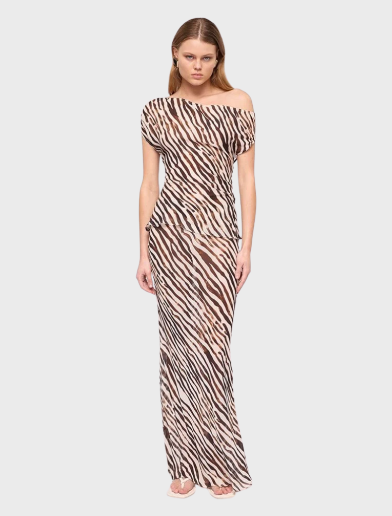 Gigi Zebra Bias Maxi Skirt featuring a bold zebra animal print design.