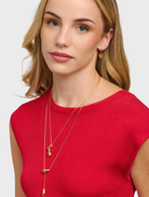 Gold Galina earrings showcasing a refined style, ideal for enhancing any outfit with a touch of sophistication.