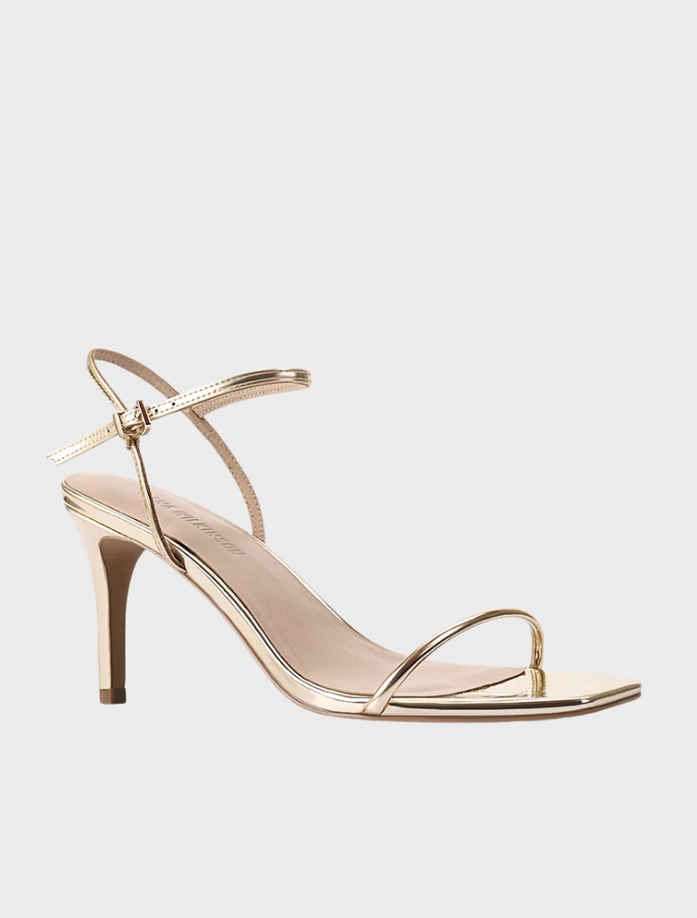 Gold metallic leather high heel sandal with a strap and ankle strap, named Vicki Sandal.