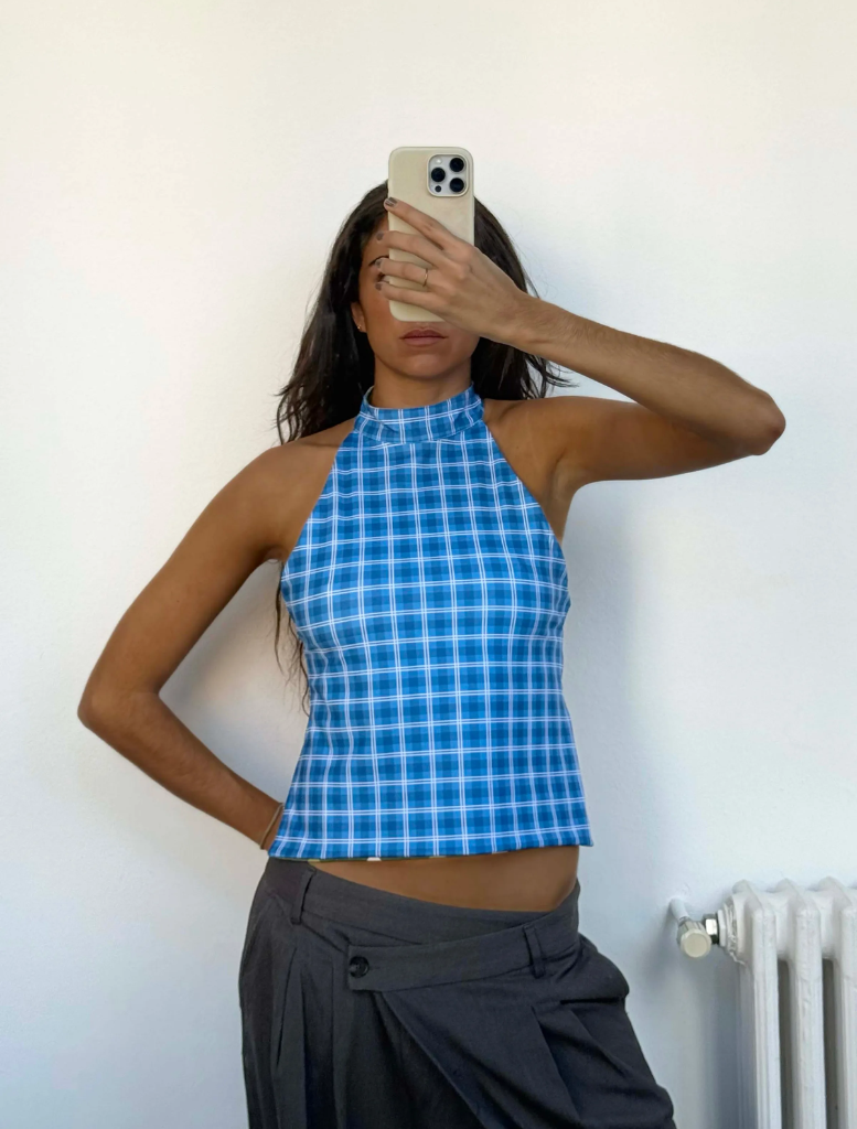 Grace Reversible Top featuring a stylish design, suitable for versatile wear in various settings and occasions.