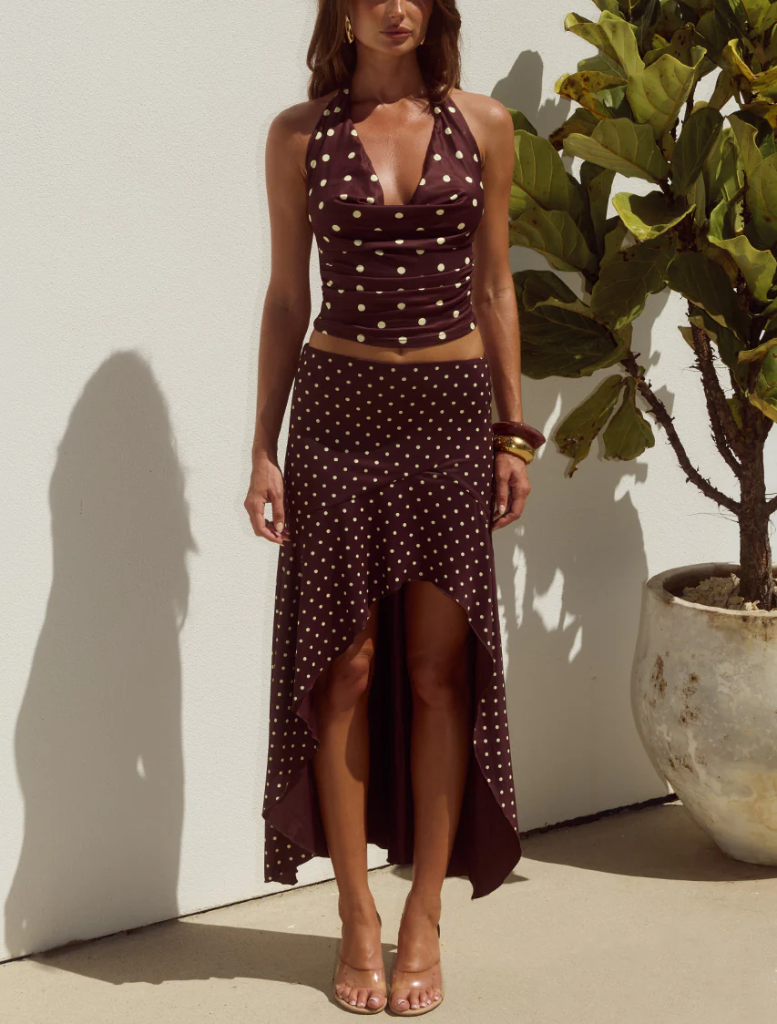 Elegant Melody Halter Cowl Top with a chocolate and lemon polka dot design, ideal for casual or dressy occasions.