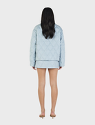 Quinton quilted jacket in ice blue, designed for warmth and style, perfect for chilly outdoor activities.