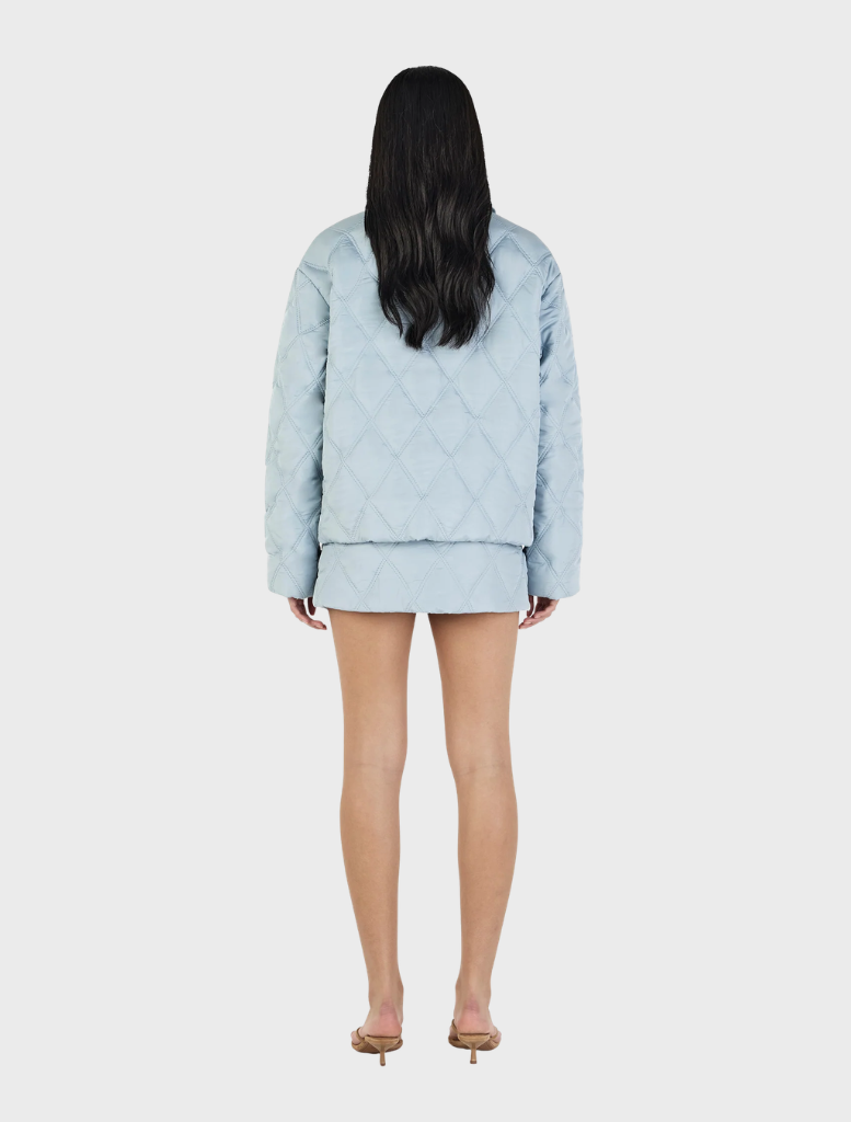 Quinton quilted jacket in ice blue, designed for warmth and style, perfect for chilly outdoor activities.