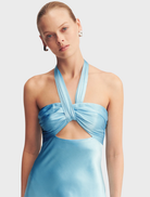 Elegant iceberg blue La Lune halter maxi dress with ruched detailing and a flowing design, perfect for formal occasions.
