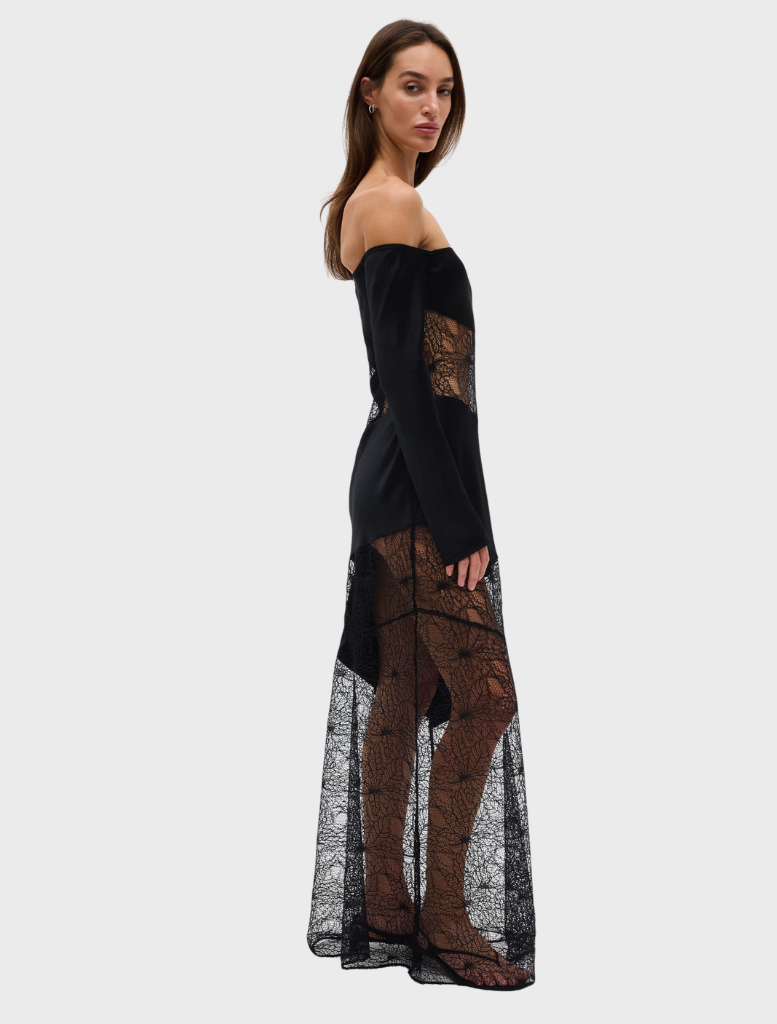 Stylish off-shoulder dress in deep ink hue, showcasing a tailored bodice and a soft, flowing silhouette.