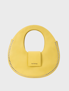 Inka Bag in Butter color, featuring a sleek design and durable material, perfect for everyday use or special occasions.