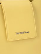 Inka Bag in a creamy Butter hue, combining fashion and functionality for everyday use and special events.