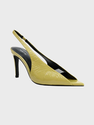 Yellow patent leather slingback pumps with a glossy finish and a crinkle texture, featuring a stylish open back design.