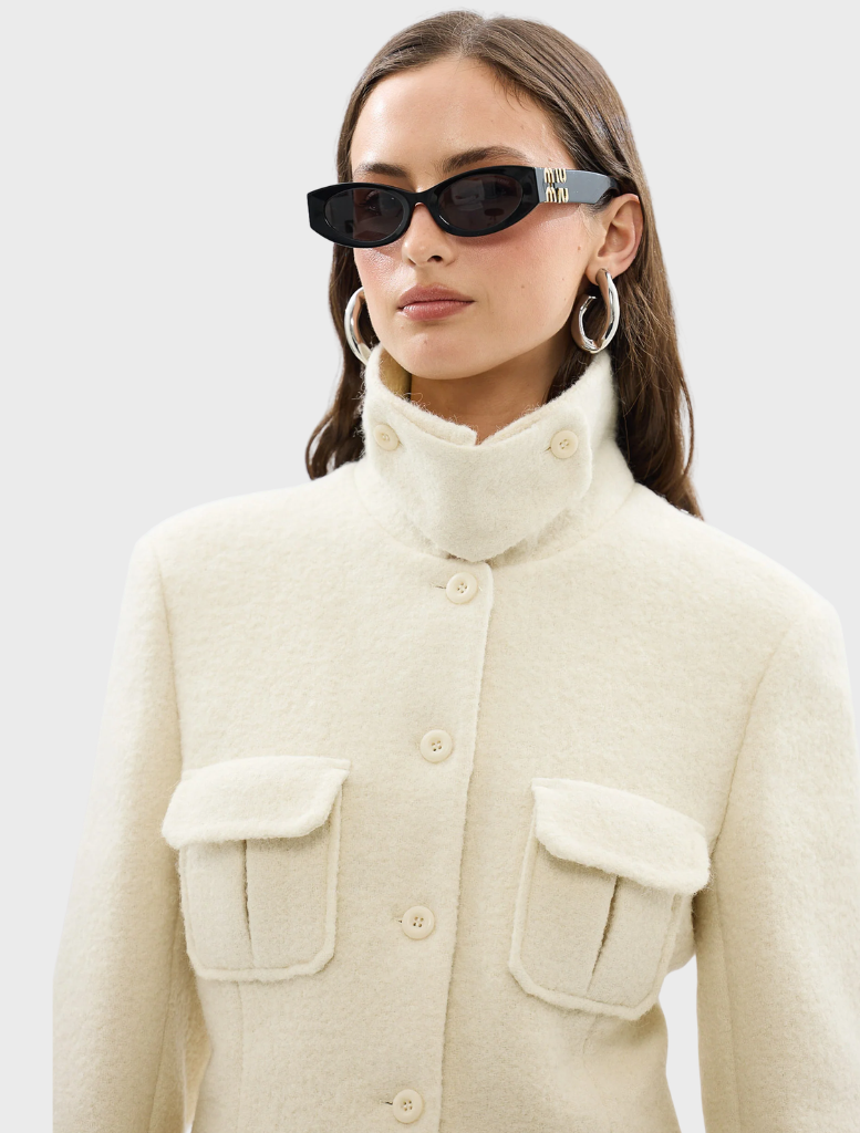 Elegant ivory Franca Wool Blazer Dress with a fitted design, ideal for professional and formal settings.