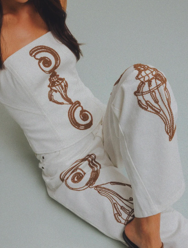 Elegant ivory Maurie Jean dress, showcasing a refined style perfect for special events and gatherings.