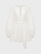 Ivory mini dress with voluminous balloon sleeves and a playful design, suitable for various social events.