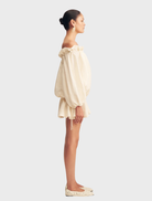 Casual mini dress crafted from linen blend fabric, presented in a resin shade for a trendy summer outfit.