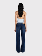 Jayda Top in cornflower blue, a relaxed jersey halter with a low cowl neck and scooped back for casual styling.