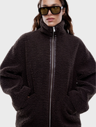 Jayla Teddy Jacket in espresso, showcasing a luxurious, soft fabric and a trendy silhouette for a chic winter look.