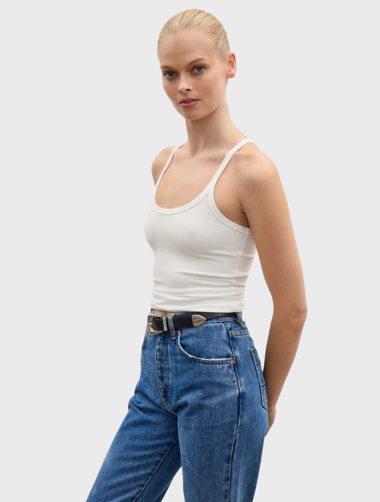 White Jayla tank top presented on a hanger, highlighting its sleek design and comfortable fabric for summer outfits.
