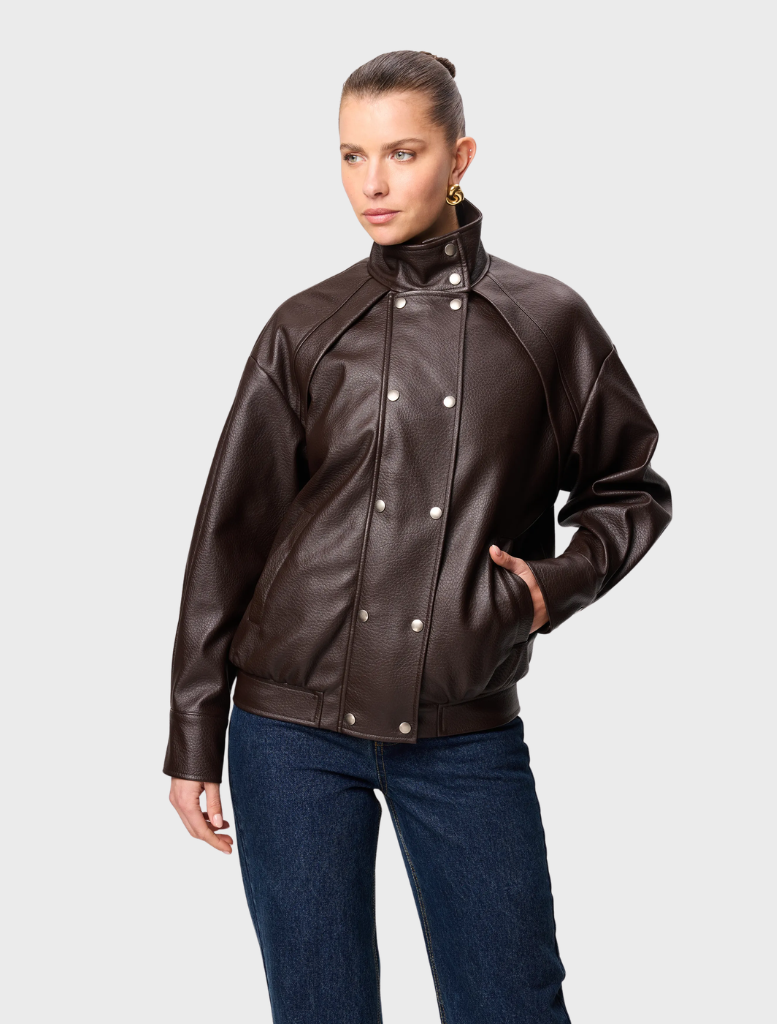 Jordan Espresso jacket featuring a sleek design and modern fit, ideal for casual and athletic wear.