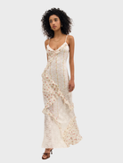 Cream-colored Josalyn Maxi Dress with a graceful silhouette, perfect for both casual and formal settings.