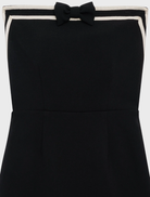 Trendy black strapless mini dress with a tailored look, suitable for both casual and formal occasions.