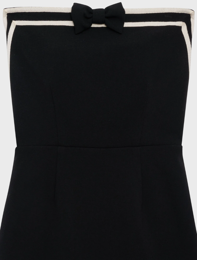 Trendy black strapless mini dress with a tailored look, suitable for both casual and formal occasions.
