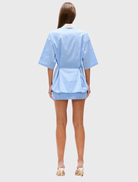 Oversized blue striped Kanzo Shirt with a white collar, button front, short sleeves, and a chest pocket for a casual look.