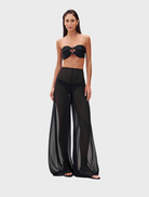 Black Karima set featuring a stylish top and matching bottoms, designed for a chic and modern look.