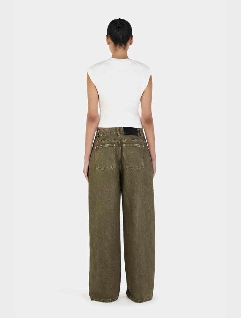 A pair of khaki Paige Denim jeans featuring a modern cut, displayed flat to highlight the fabric and stitching details.