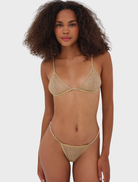 Shimmering gold bralette adorned with glitter, perfect for adding sparkle to any outfit.
