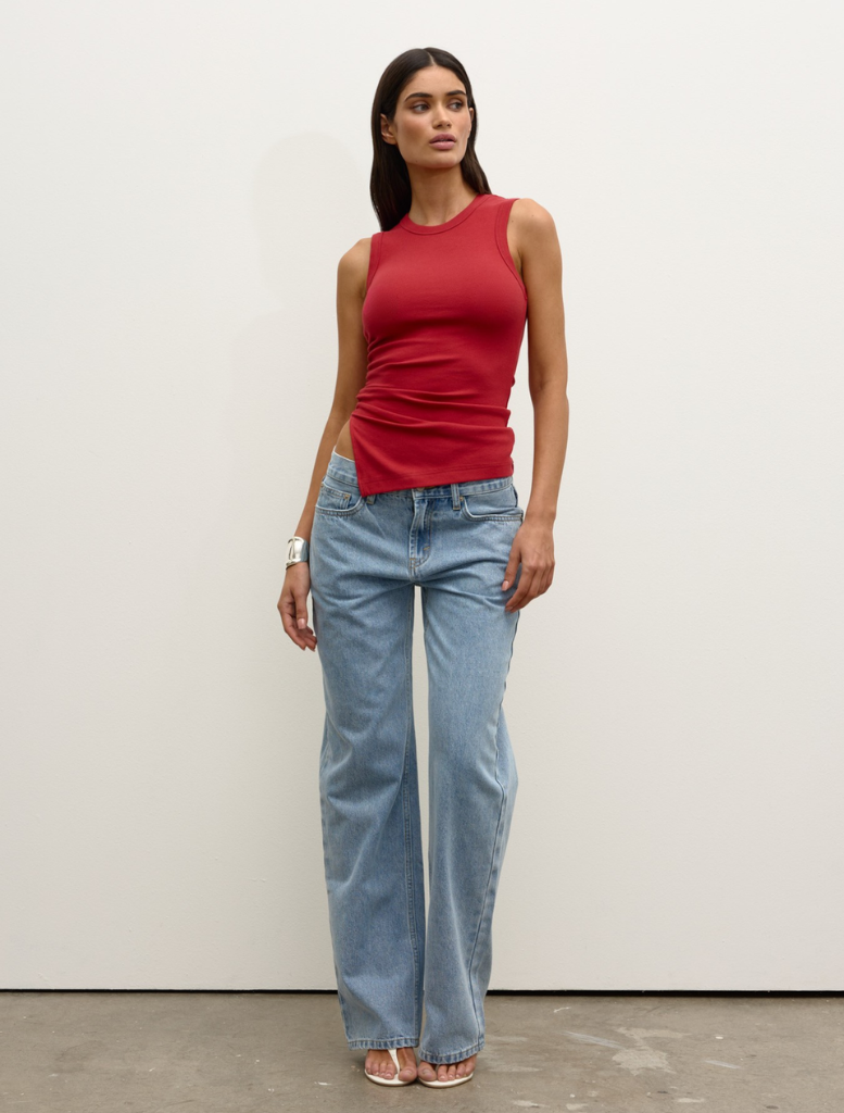 Vibrant red Lana Rouched Tank showcasing a chic ruched detail, suitable for both everyday wear and special events.
