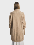 Elegant Sophia Open Cashmere Cardigan in latte shade, designed for comfort with an open front and soft cashmere fabric.