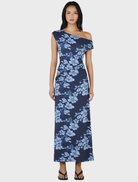 A navy maxi dress featuring a rolling waves pattern, showcasing a flowing silhouette and elegant design.