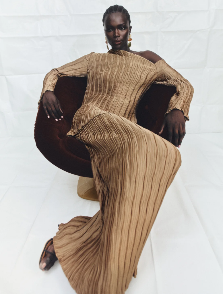 Leda Maxi Skirt in oak shade, showcasing a chic and flowing silhouette ideal for both casual and dressy looks.