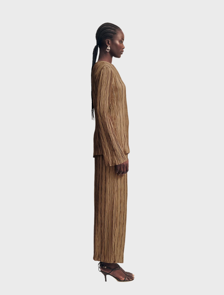 Leda Maxi Skirt in a warm oak hue, offering a stylish and versatile addition to any wardrobe.