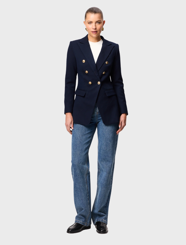 Close-up of a navy Legacy Blazer, emphasizing its refined lapels and tailored fit.