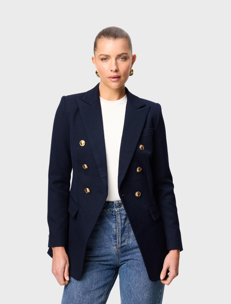 Navy Legacy Blazer displayed on a hanger, featuring a tailored fit and classic lapel design.