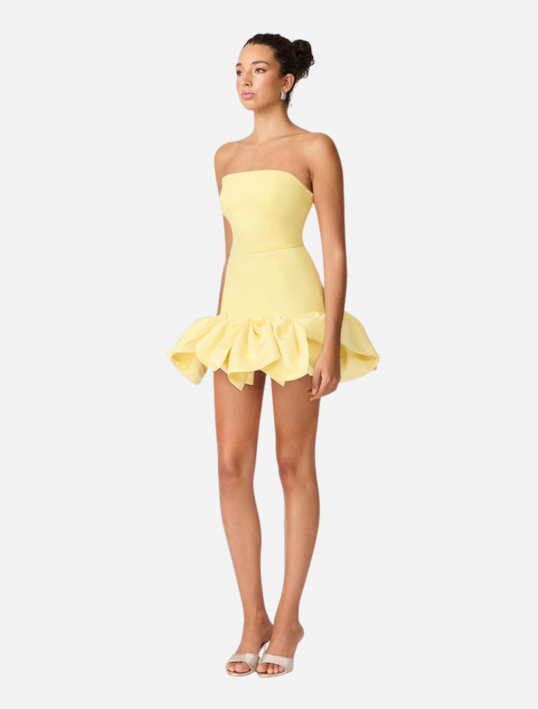 Yellow strapless mini dress with ruffles, identified as the Evee Strapless Mini Dress - Lemon.